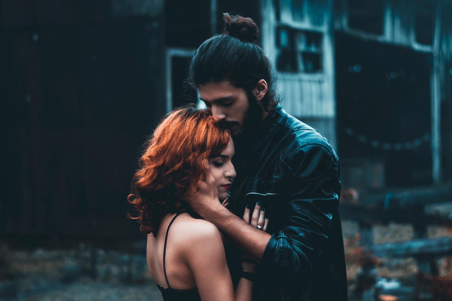 shallow focus photography of man and woman hugging by Allan Filipe Santos Dias on Unsplash